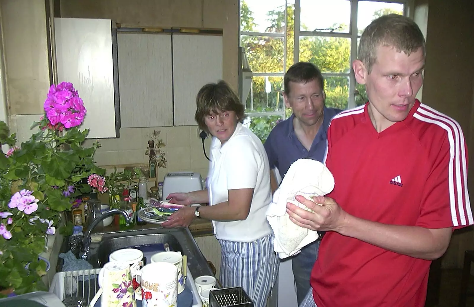 Pippa brings some actual washing-up over, from A Rabbit Barbeque, Dairy Farm, Thrandeston - 14th September 2003