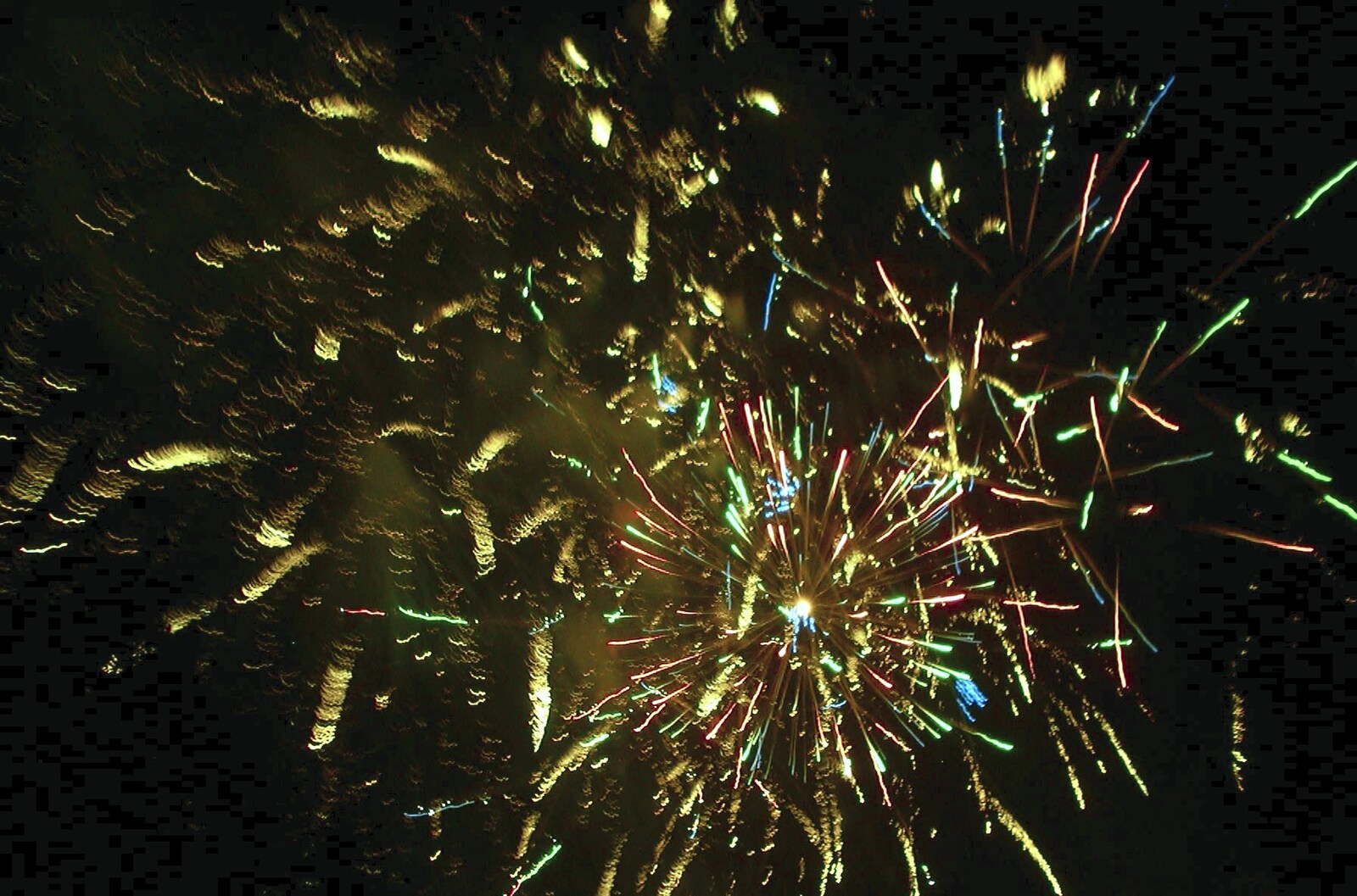 A yellow and blue explosion from Fireworks and Fairgrounds with Mikey P, Fair Green, Diss, Norfolk - 5th November 2003