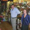 Alan and Sylvia behind the bar, Twenty Years at The Swan Inn, Brome, Suffolk - 15th November 2003