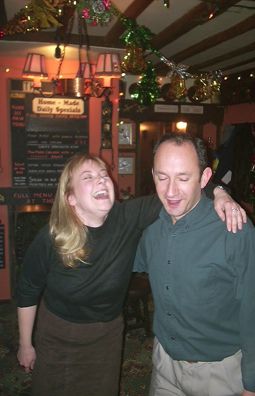 Carolyn has a laff from The BSCC Christmas Dinner, The Swan Inn, Brome, Suffolk  - 6th December 2003