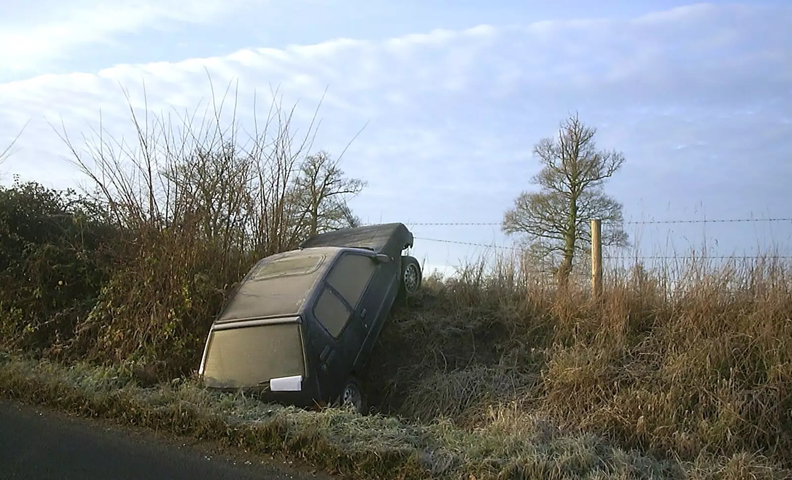 Some tool has ended up in a ditch near Thornham, from The BSCC Christmas Dinner, The Swan Inn, Brome, Suffolk  - 6th December 2003