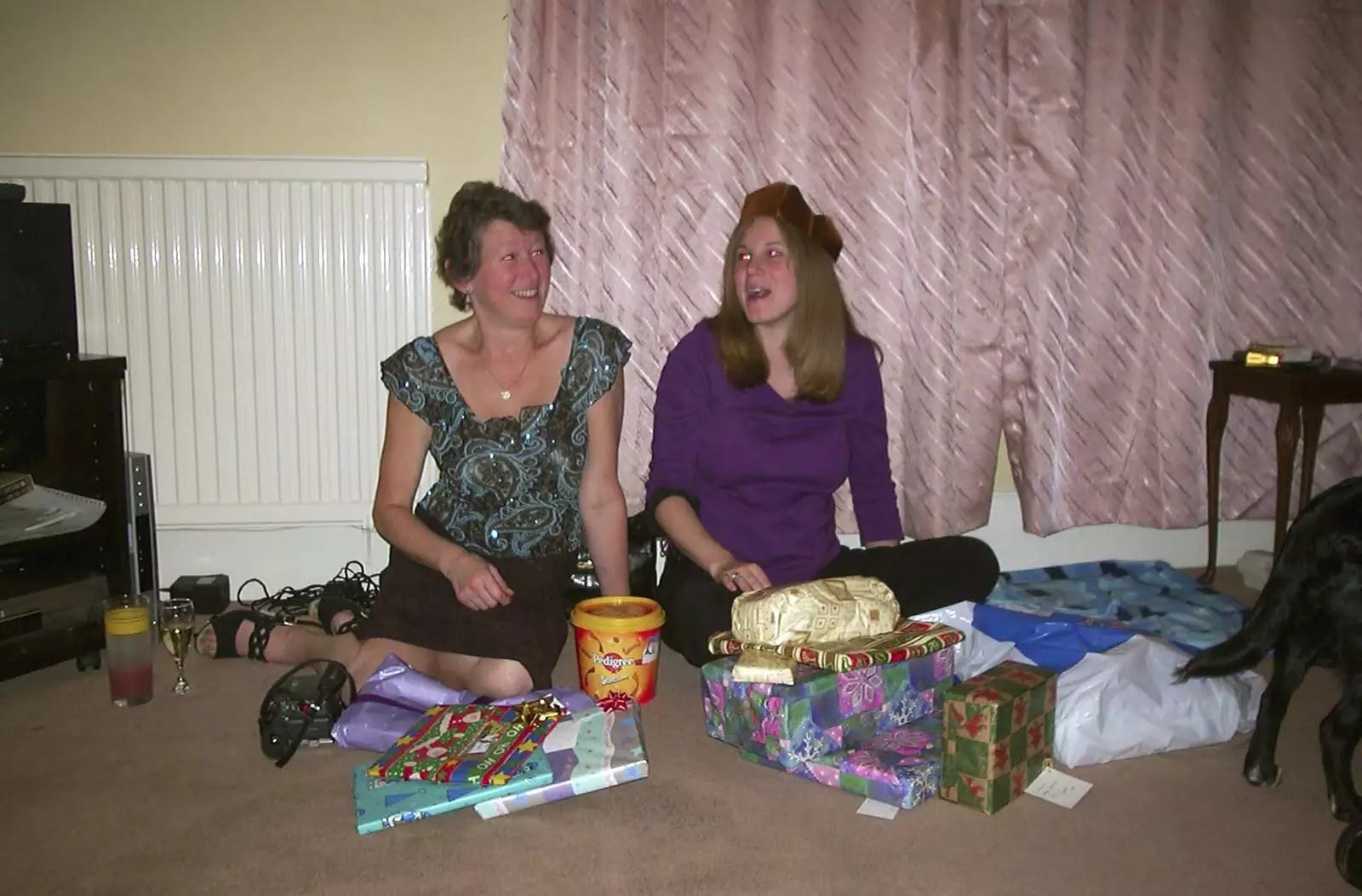 Lorraine and Sylvia prepare for presents, from Christmas at The Cottage, Thorpe St. Andrew, Norwich - 25th December 2003