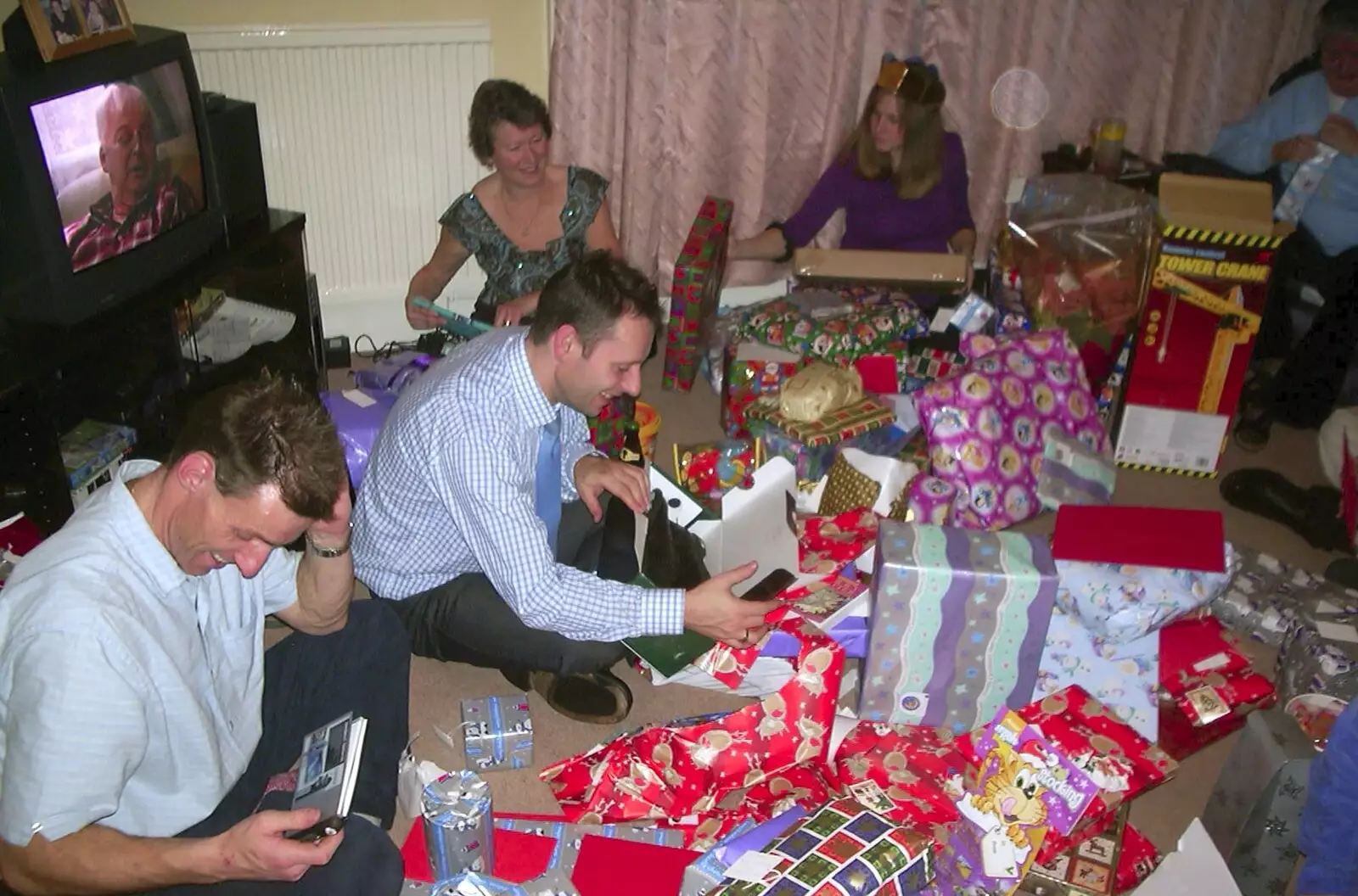 The room is full of presents and wrapping paper, from Christmas at The Cottage, Thorpe St. Andrew, Norwich - 25th December 2003