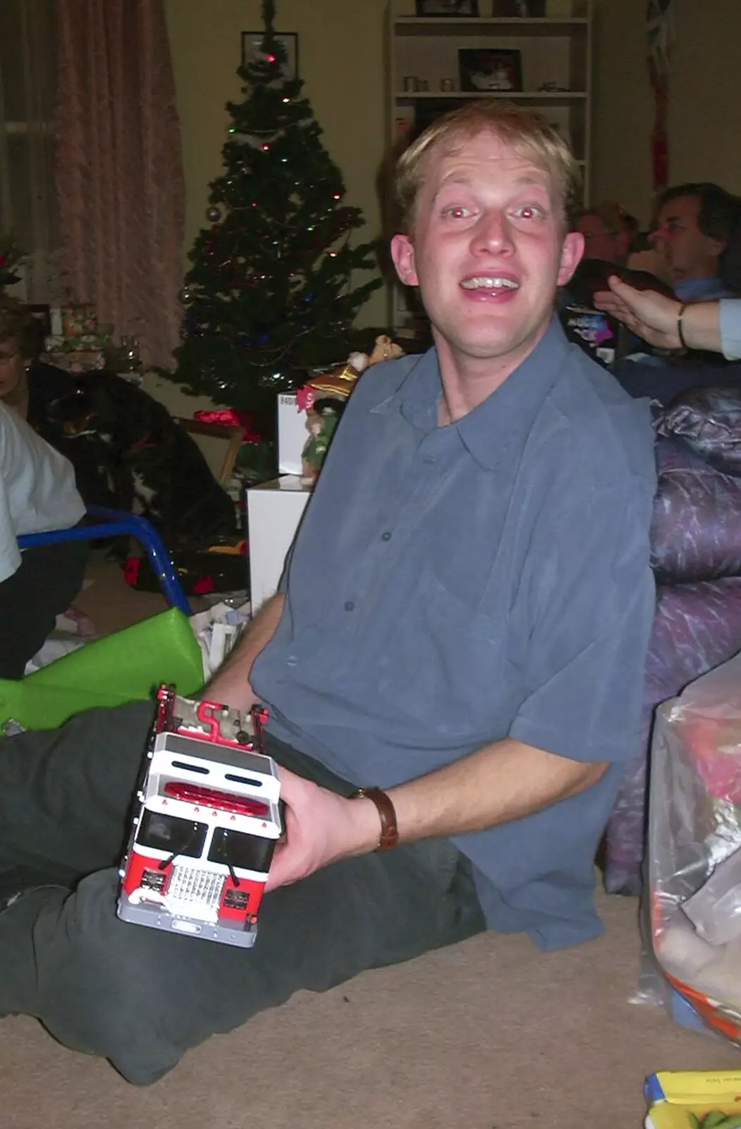 Paul's got a toy lorry, from Christmas at The Cottage, Thorpe St. Andrew, Norwich - 25th December 2003