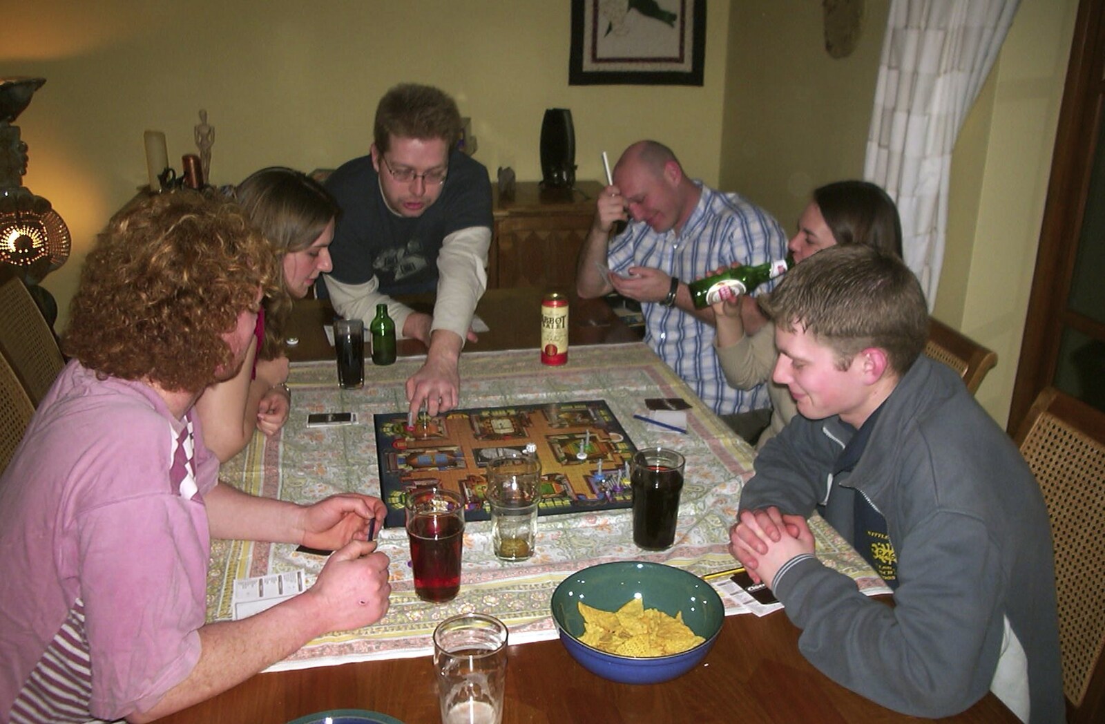 An intense game of Cluedo is in progress from Sarah's Games Night at Anne's, Thornham, Suffolk - 27th December 2003