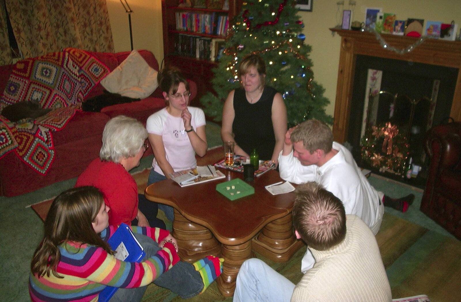 Meanwhile, another game is in progress in the lounge from Sarah's Games Night at Anne's, Thornham, Suffolk - 27th December 2003