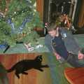 Phil teases Mini the cat with string, Sarah's Games Night at Anne's, Thornham, Suffolk - 27th December 2003