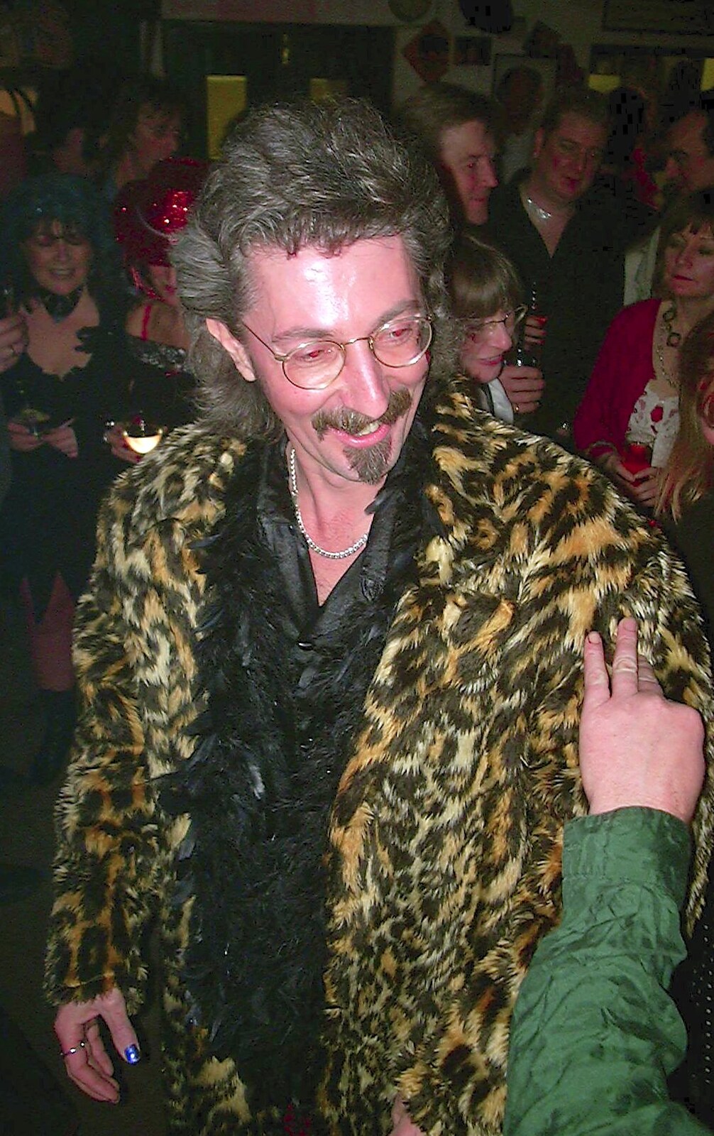 Rob's faux-fur coat is inspected from The BBs do New Year's Eve at The Cider Shed, Banham, Norfolk - 31st December 2003