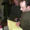 DH scopes out the menu, A Chinese-themed Murder Mystery, Eye, Suffolk - 7th February 2004