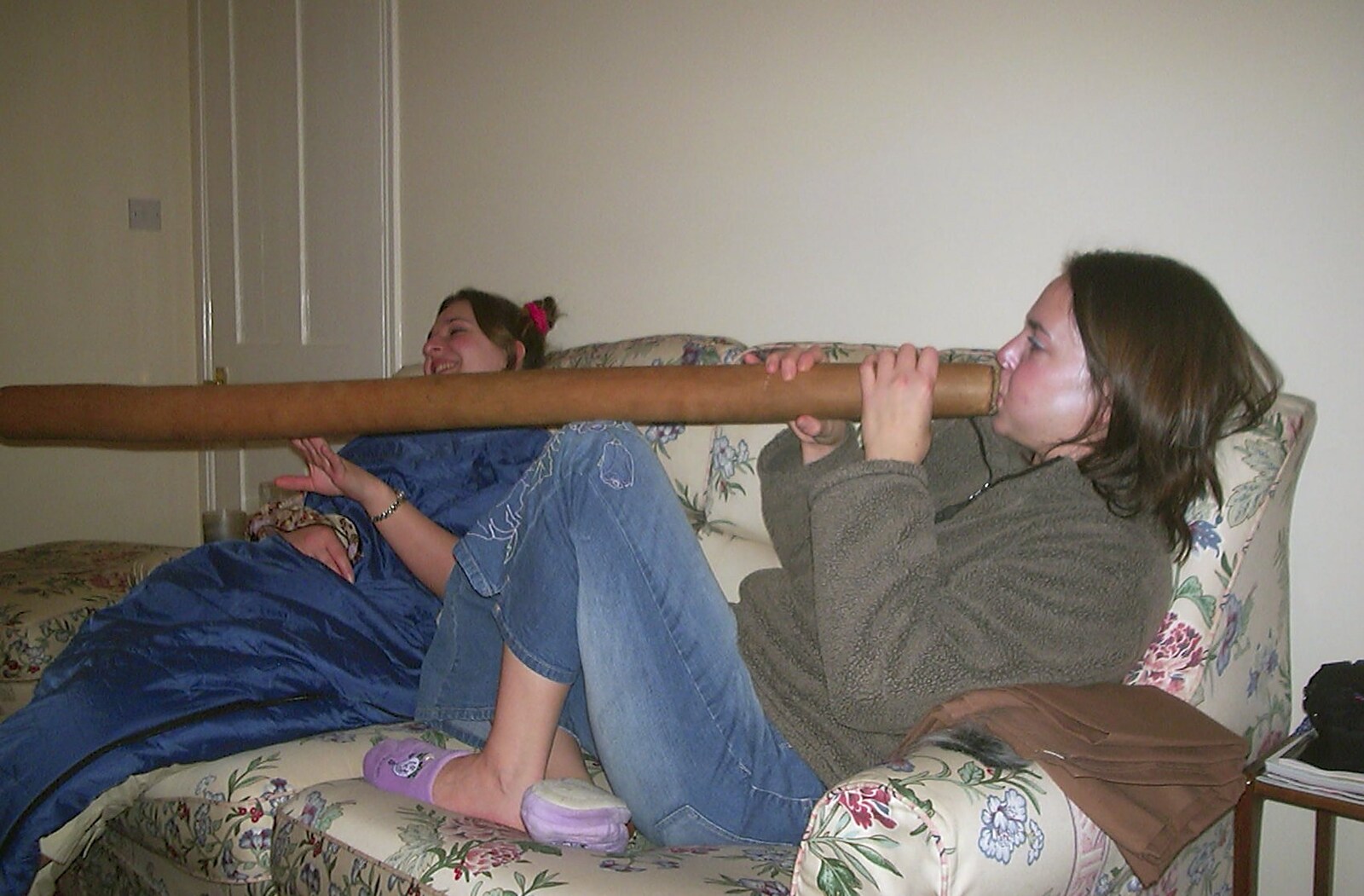 Jen tries a didgeridoo from A Chinese-themed Murder Mystery, Eye, Suffolk - 7th February 2004