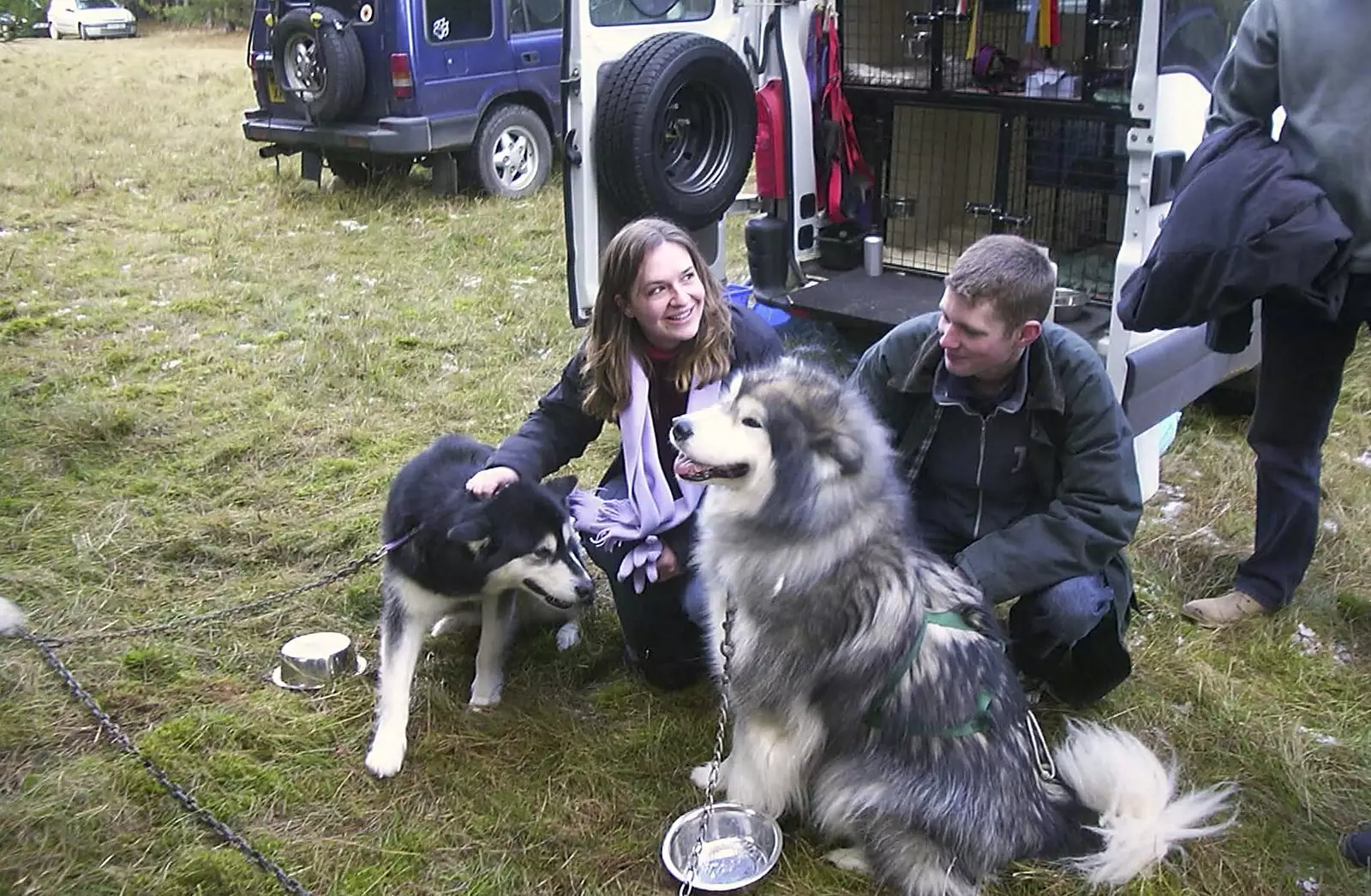 Jess and The Boy Phil with some huskies, from A day at the Husky Races, Lakenheath, Suffolk - 29th February 2004