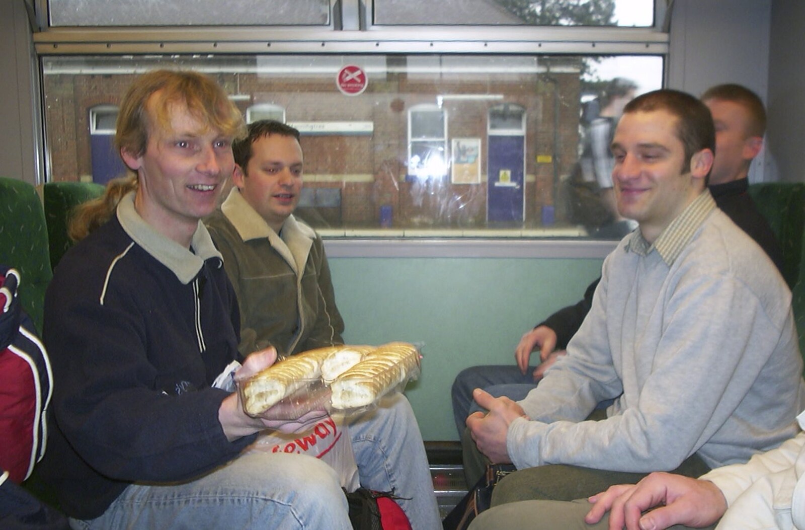Jimmy gets his stash of sausage rolls out from Mikey-P's Stag Weekend, Amsterdam, Netherlands - 5th March 2004