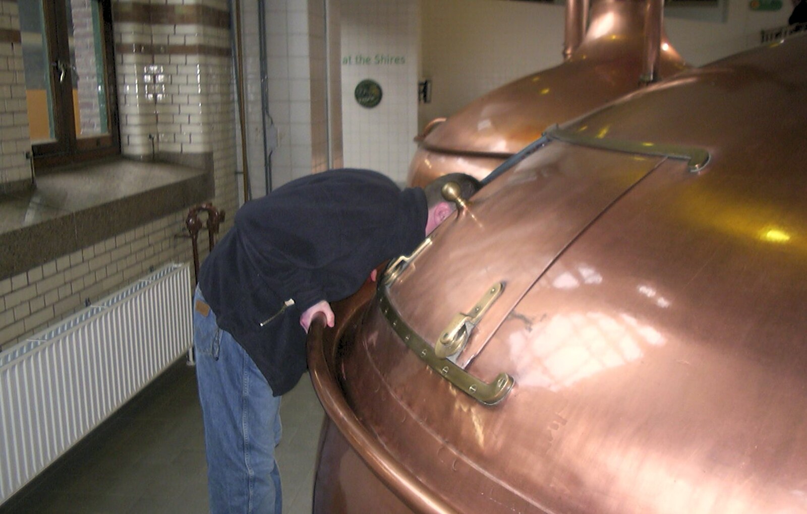 The Boy Phil sticks his head in a copper fermenter from Anne Frank, Markets and Mikey-P's Stag Do, Amsterdam, Netherlands - 6th March 2004