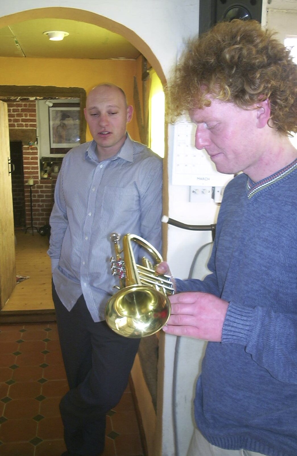 The next morning, Wavy has a go on a trumpet from Mikey-P and Clare's Wedding Reception, Brome Grange, Suffolk - 20th March 2004