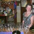 Paul and Claire's Engagement Party, Brome Swan, Suffolk - 27th March 2004, Sylvia with a load of clean glasses