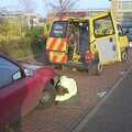 The AA man pokes around under the car, A March Miscellany: The BBs, Pulham Pubs and Broken Cars - Norfolk and Cambridgeshire, 31st March 2004