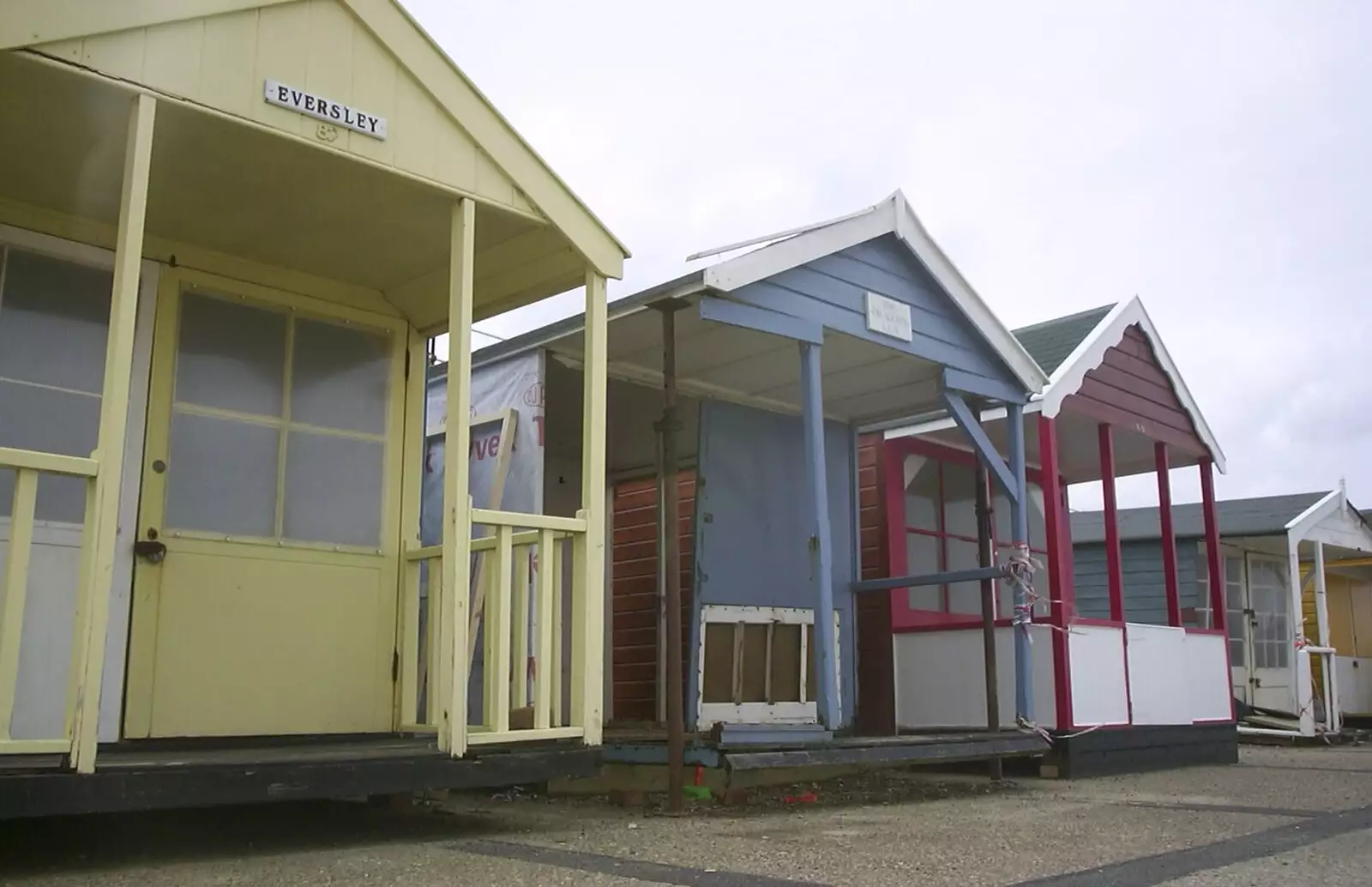 Damaged beach huts, from Moping in Southwold, Suffolk - 3rd April 2004