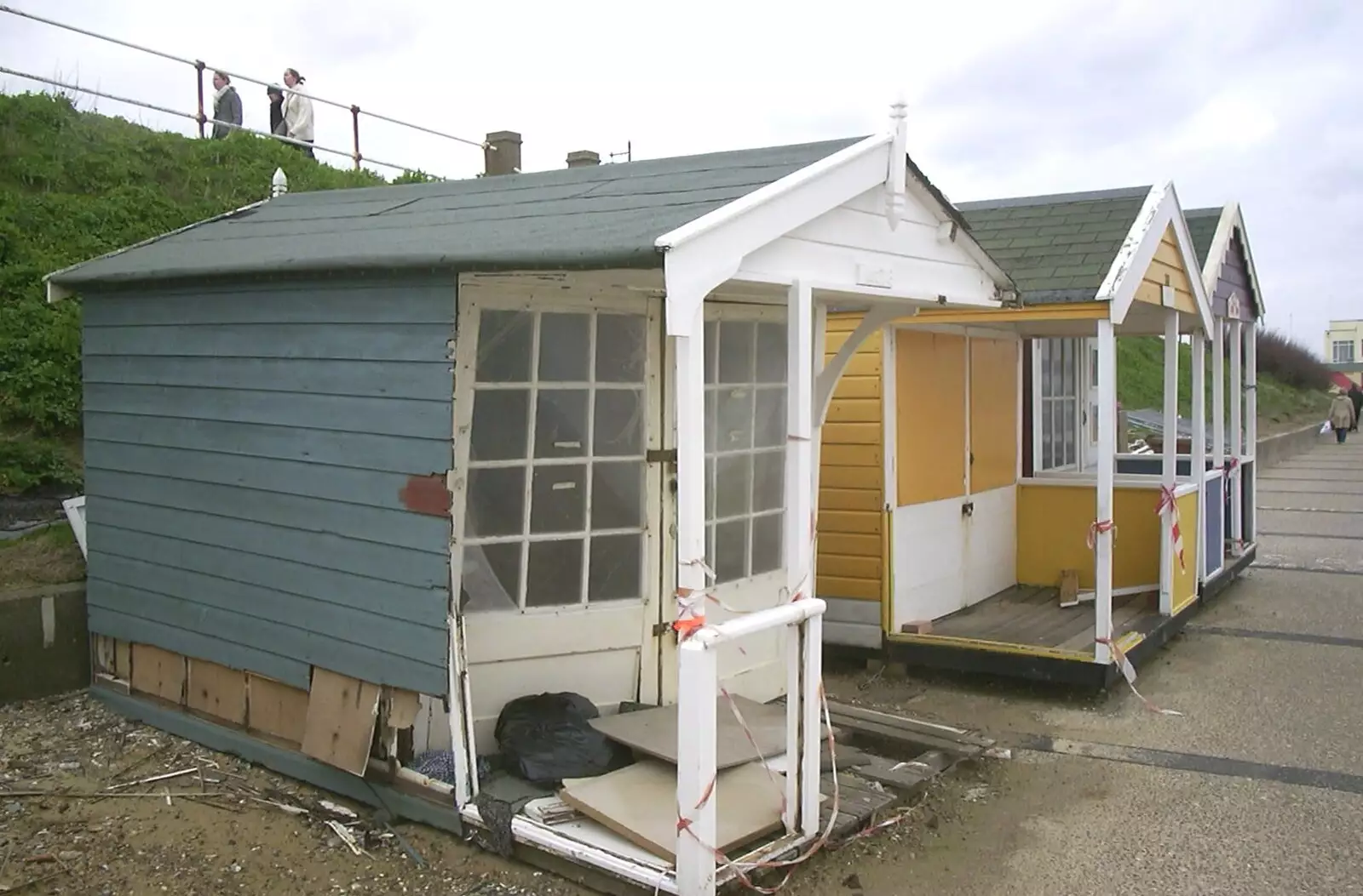 Beach huts, trashed by the sea, from Moping in Southwold, Suffolk - 3rd April 2004