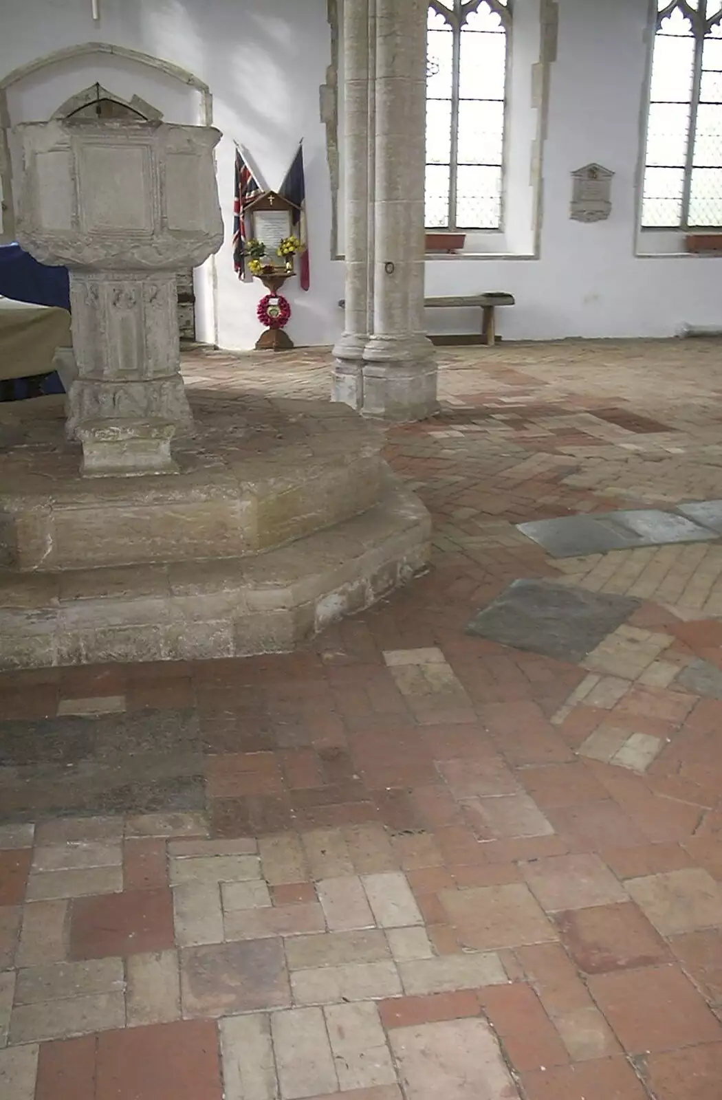 Brick floor, and the font, from Moping in Southwold, Suffolk - 3rd April 2004