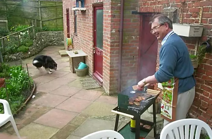 Jess's dad mans the barbeque, from Jess's Post-Birthday Barbeque and a Walk Around Pulham - 4th April 2004