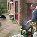 Outside, Jess's dad mans the barbeque, whilst Scoobert herds a small leaf (which he barks at every time it moves)