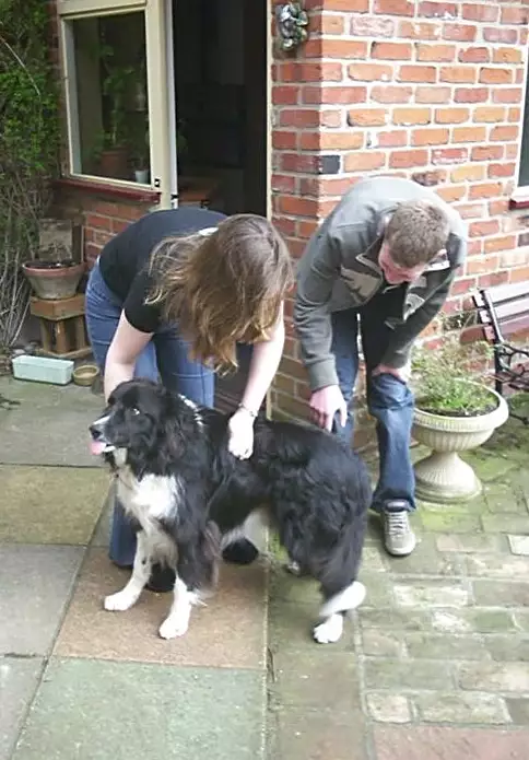 Jess and Phil play with Scooby, from Jess's Post-Birthday Barbeque and a Walk Around Pulham - 4th April 2004