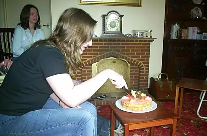 Jess cuts her birthday cake, from Jess's Post-Birthday Barbeque and a Walk Around Pulham - 4th April 2004