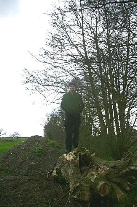 Jess's Post-Birthday Barbeque and a Walk Around Pulham - 4th April 2004: Nosher stands on a tree stump