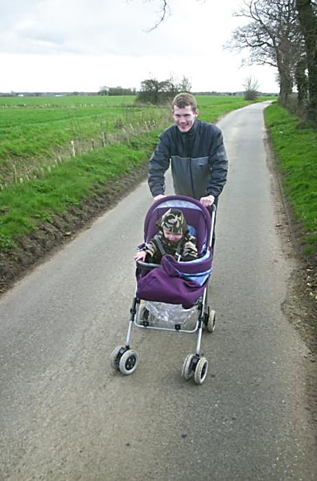 Jess's Post-Birthday Barbeque and a Walk Around Pulham - 4th April 2004: Andy's on buggy duty
