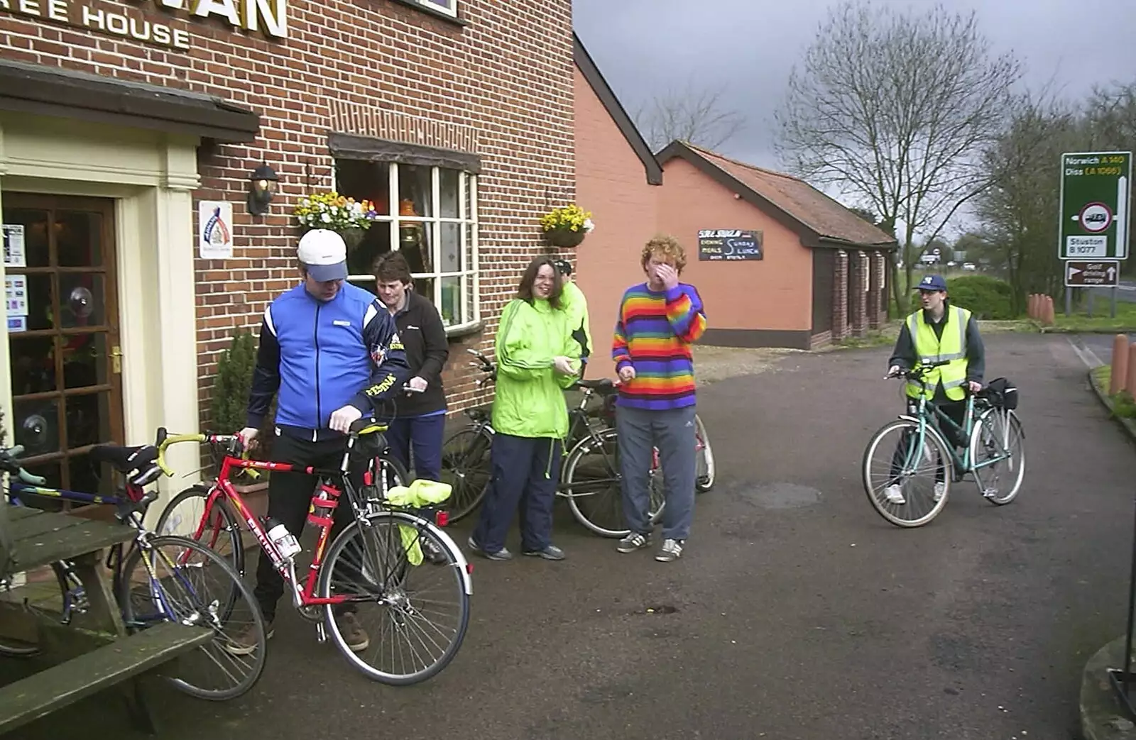 The group of riders assembles outside the Swan, from The BSCC Easter Bike Ride, Thelnetham and Redgrave, Suffolk - 10th April 2004