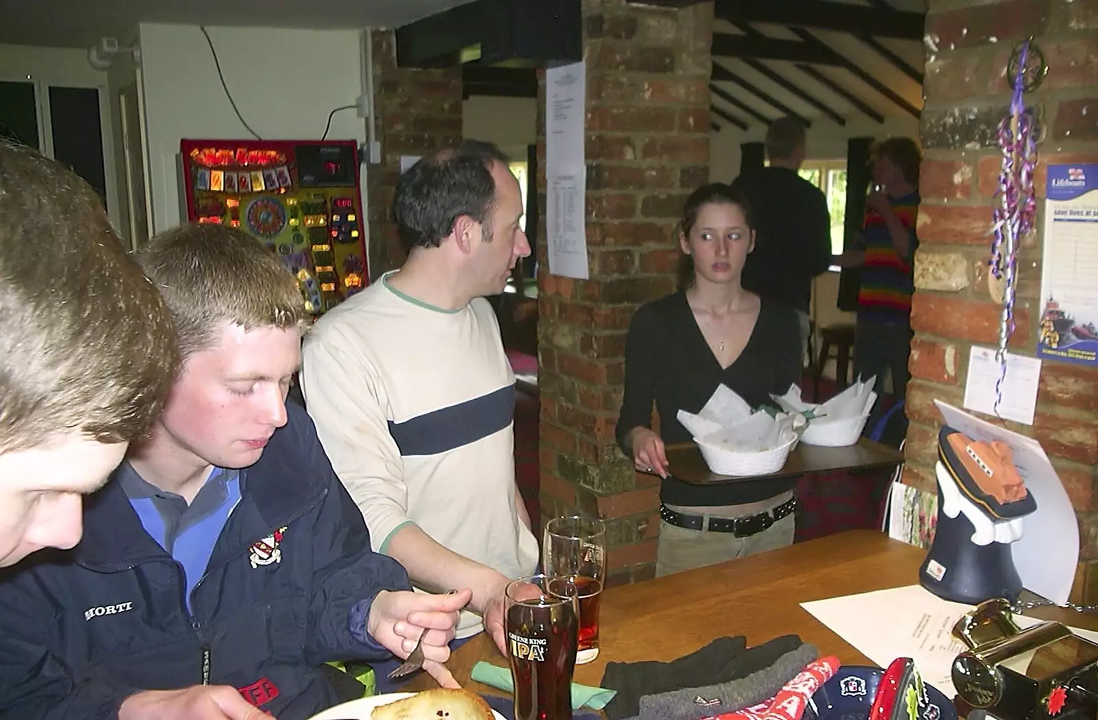 The waitress looks at us suspiciously, from The BSCC Easter Bike Ride, Thelnetham and Redgrave, Suffolk - 10th April 2004