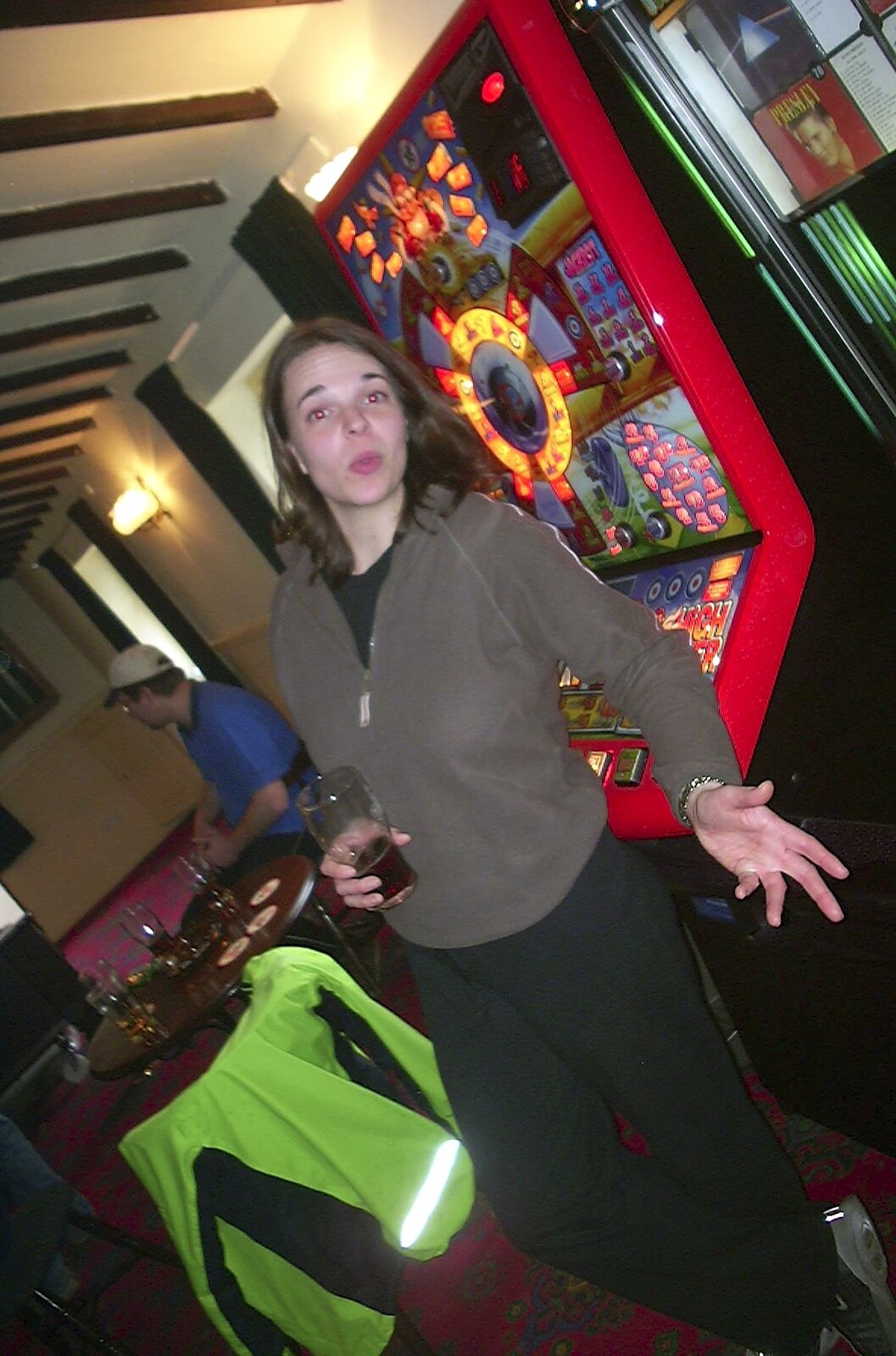 Jen by a fruit machine from The BSCC Easter Bike Ride, Thelnetham and Redgrave, Suffolk - 10th April 2004