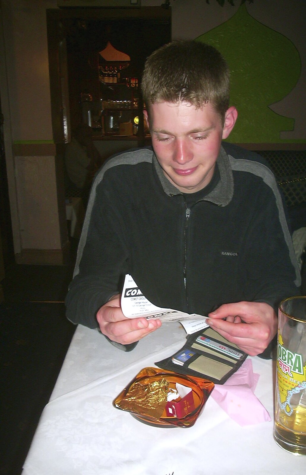 The Boy Phil checks the bill from A Car in Bits and a Trip to Diss Tandoori, Diss, Norfolk - 12th April 2004