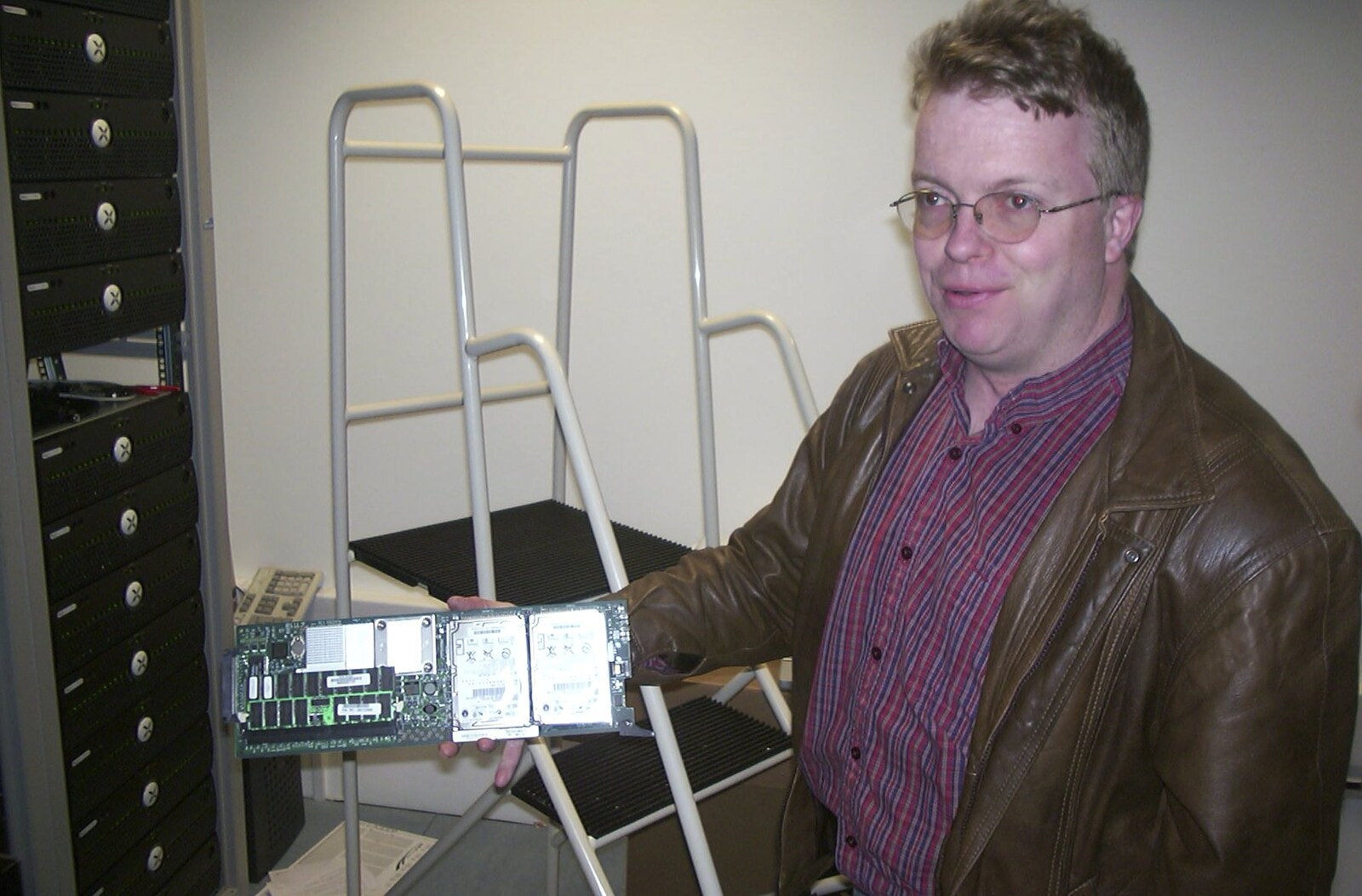 Dave's colleagure shows us a new Blade Server from A Trigenix Trip to the Sanger Centre, Hinxton, Cambridgeshire - 23rd April 2004