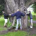 There's some tree hugging occuring of a Lebanese cypress, A Trip Around Leeds Castle, Maidstone, Kent - 9th May 2004