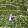 Carolyn strides around in the maze, A Trip Around Leeds Castle, Maidstone, Kent - 9th May 2004