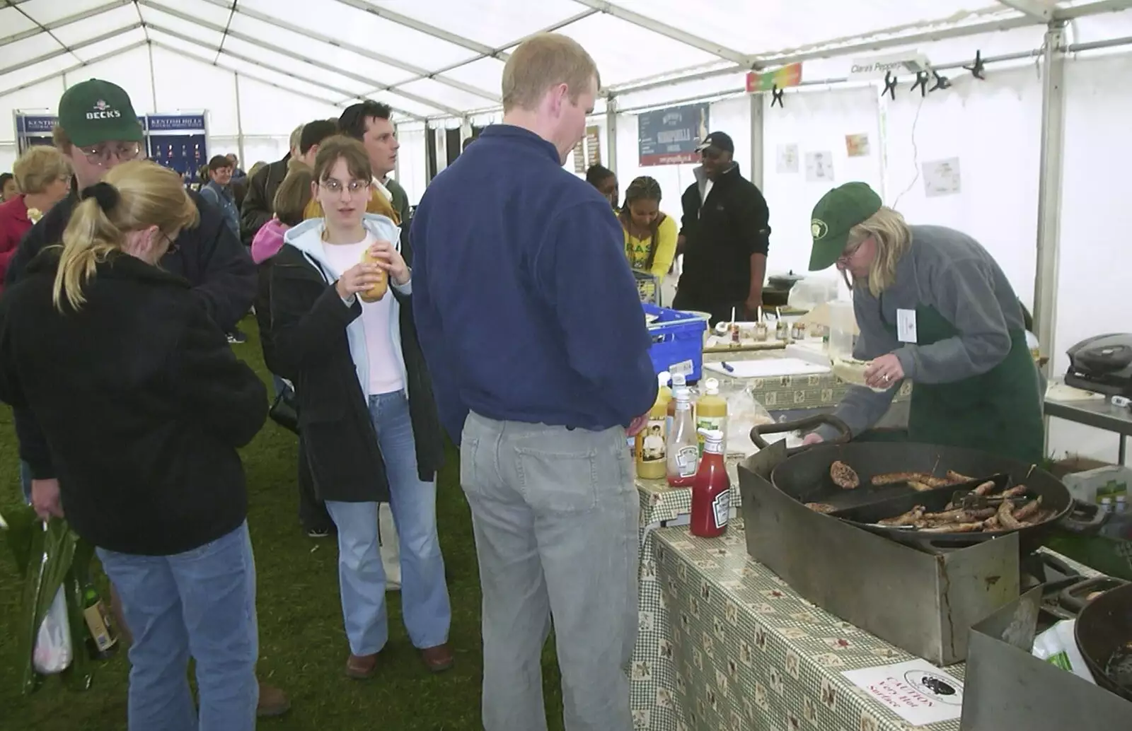 Back in the food tent for some burgers and sausages, from A Trip Around Leeds Castle, Maidstone, Kent - 9th May 2004