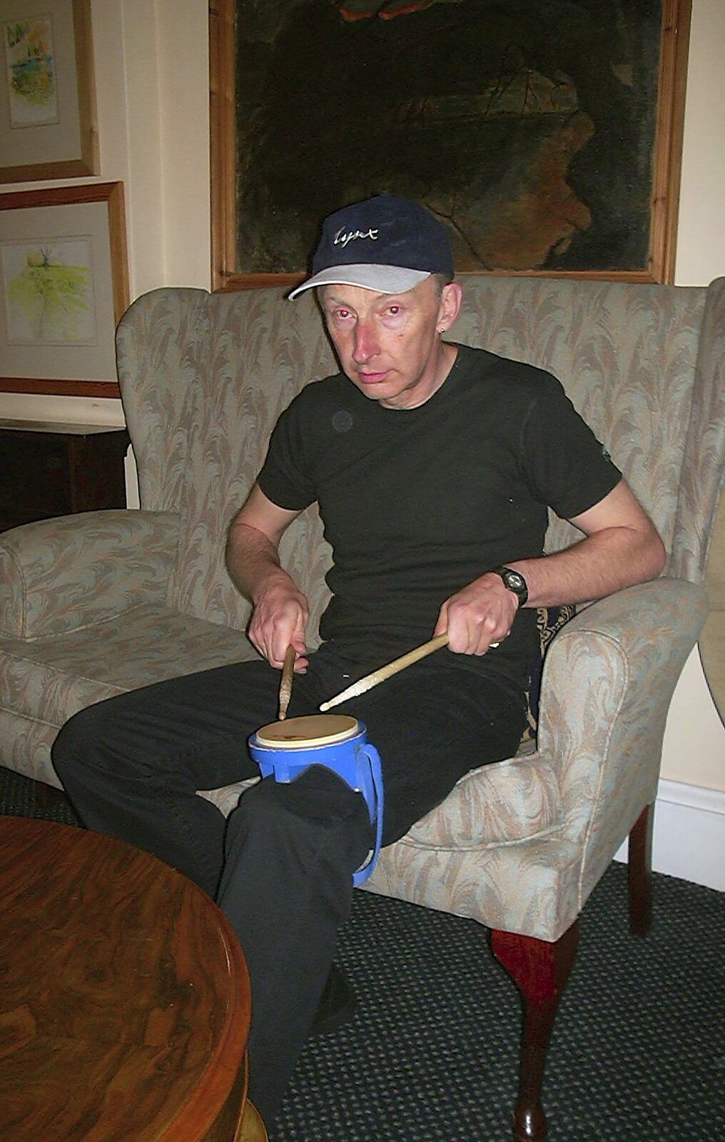 Henry warms up with a knee-based practice drum from The BBs do Gissing Hall, and a Night in the Garden, Brome, Suffolk - 14th May 2004
