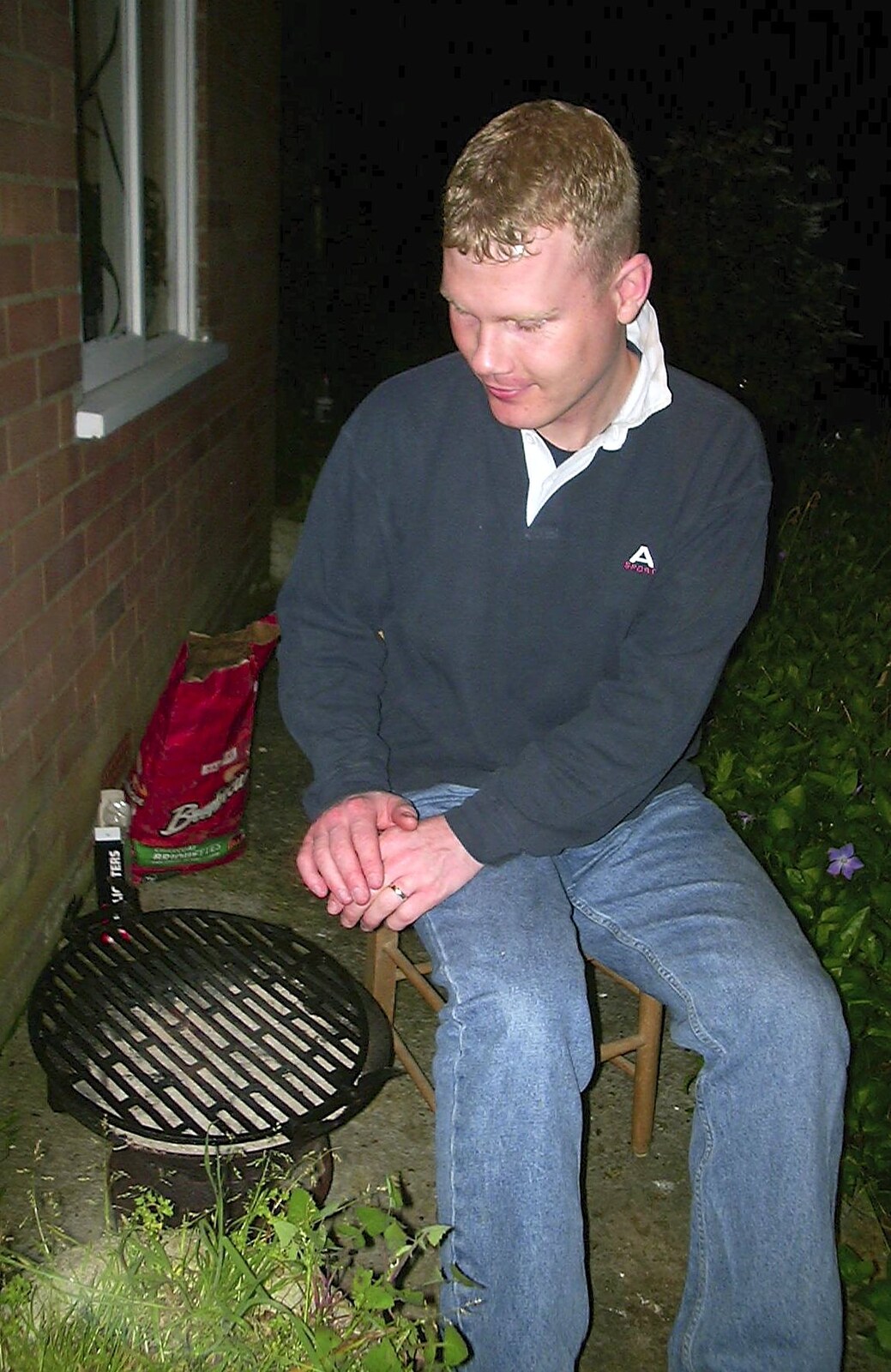 Mikey-P warms his hands up on the barbeque from The BBs do Gissing Hall, and a Night in the Garden, Brome, Suffolk - 14th May 2004