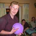 Mikey shows off a purple plate