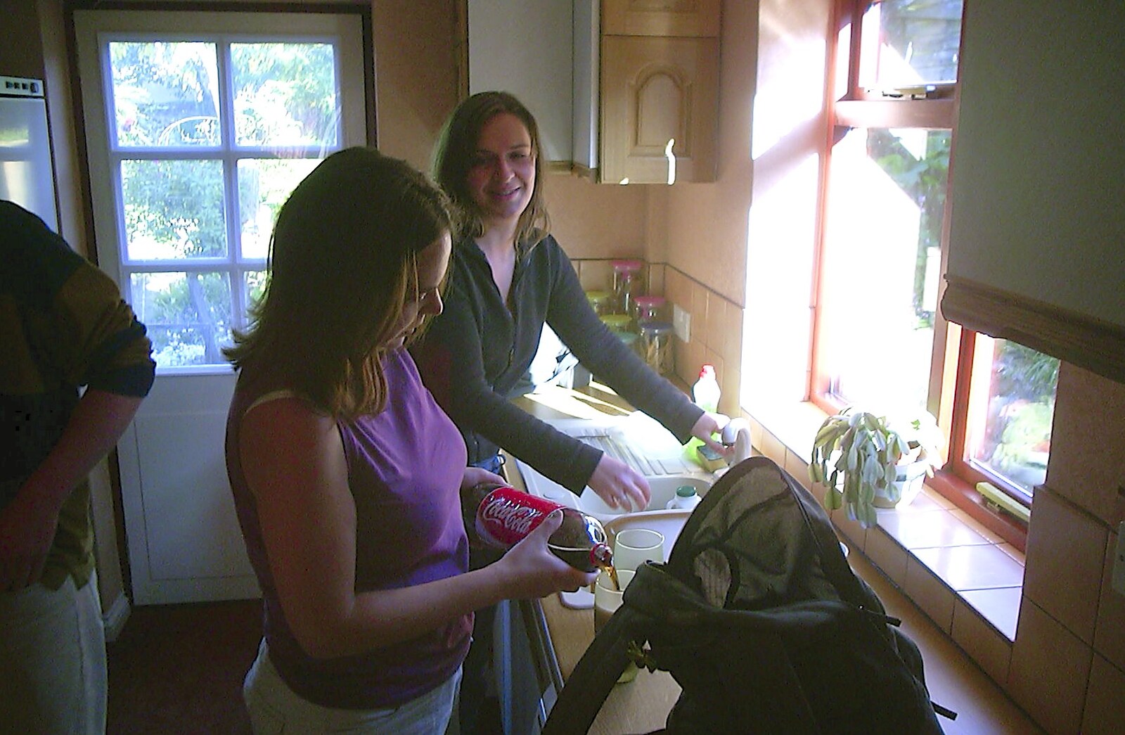 Trigenix Mexican and a Fire-Escape Barbeque, Eye, Suffolk - 22nd May 2004: Jen pours a coke