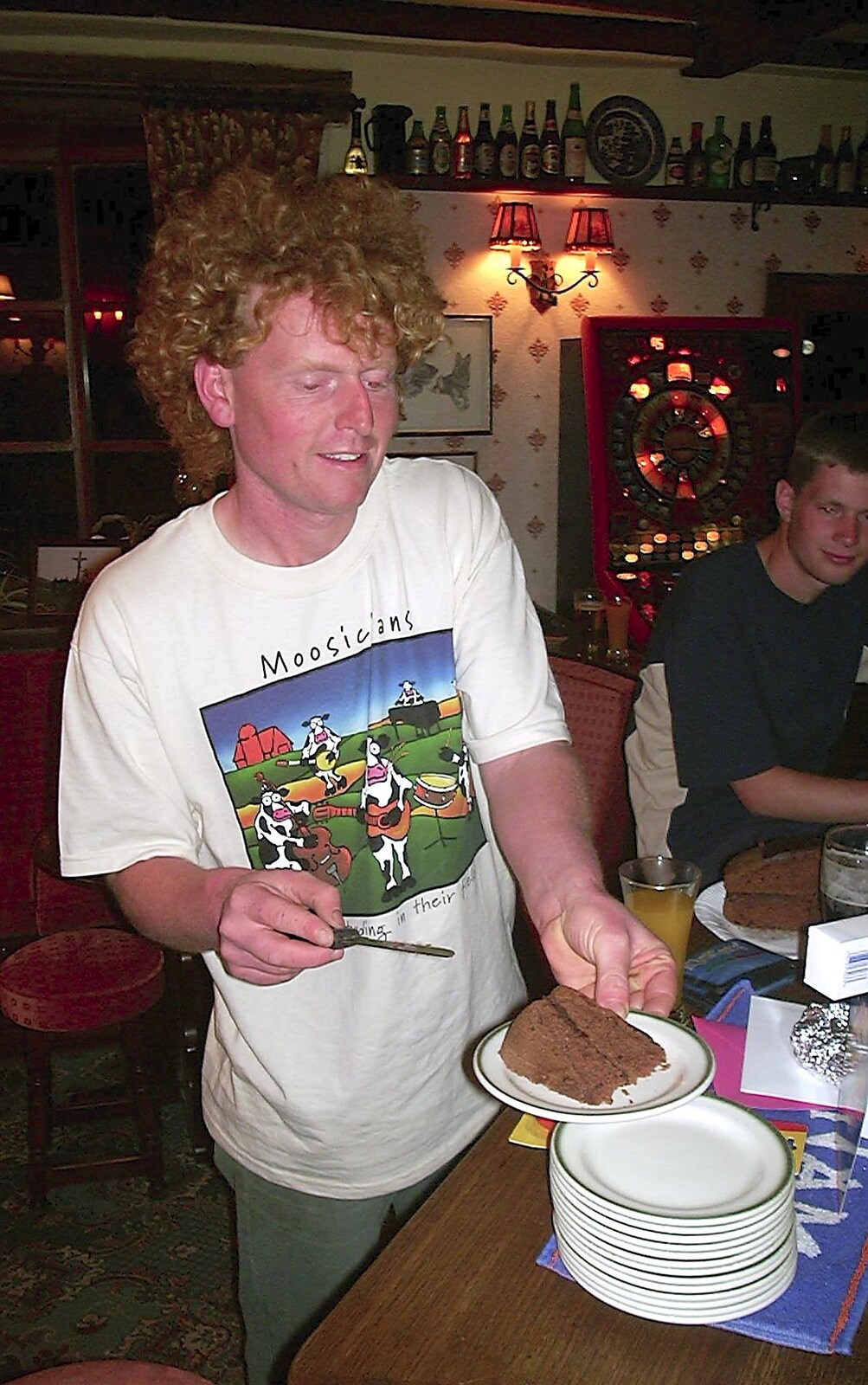 Wavy cuts the cake from Wavy's Birthday at the Swan Inn, Brome, Suffolk - 24th May 2004