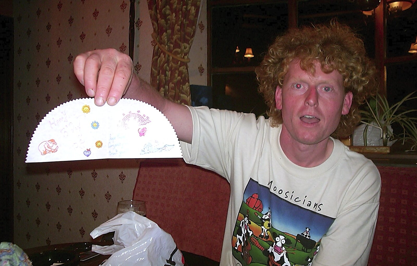 Wavy holds up his creation from Wavy's Birthday at the Swan Inn, Brome, Suffolk - 24th May 2004