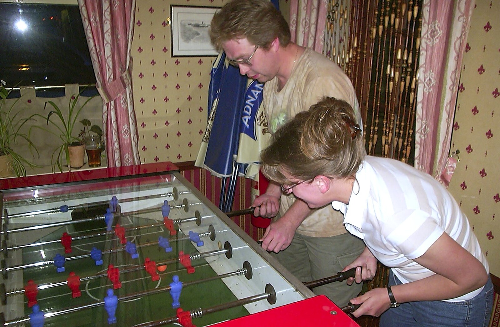 Marc and Suey are on the table football from Wavy's Birthday at the Swan Inn, Brome, Suffolk - 24th May 2004