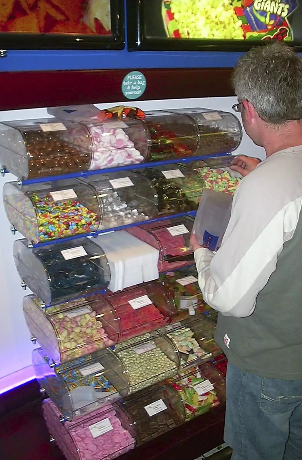 John Tate gets some pick'n'mix, from Mother and Mike Visit, Aldringham, Suffolk - 26th May 2004