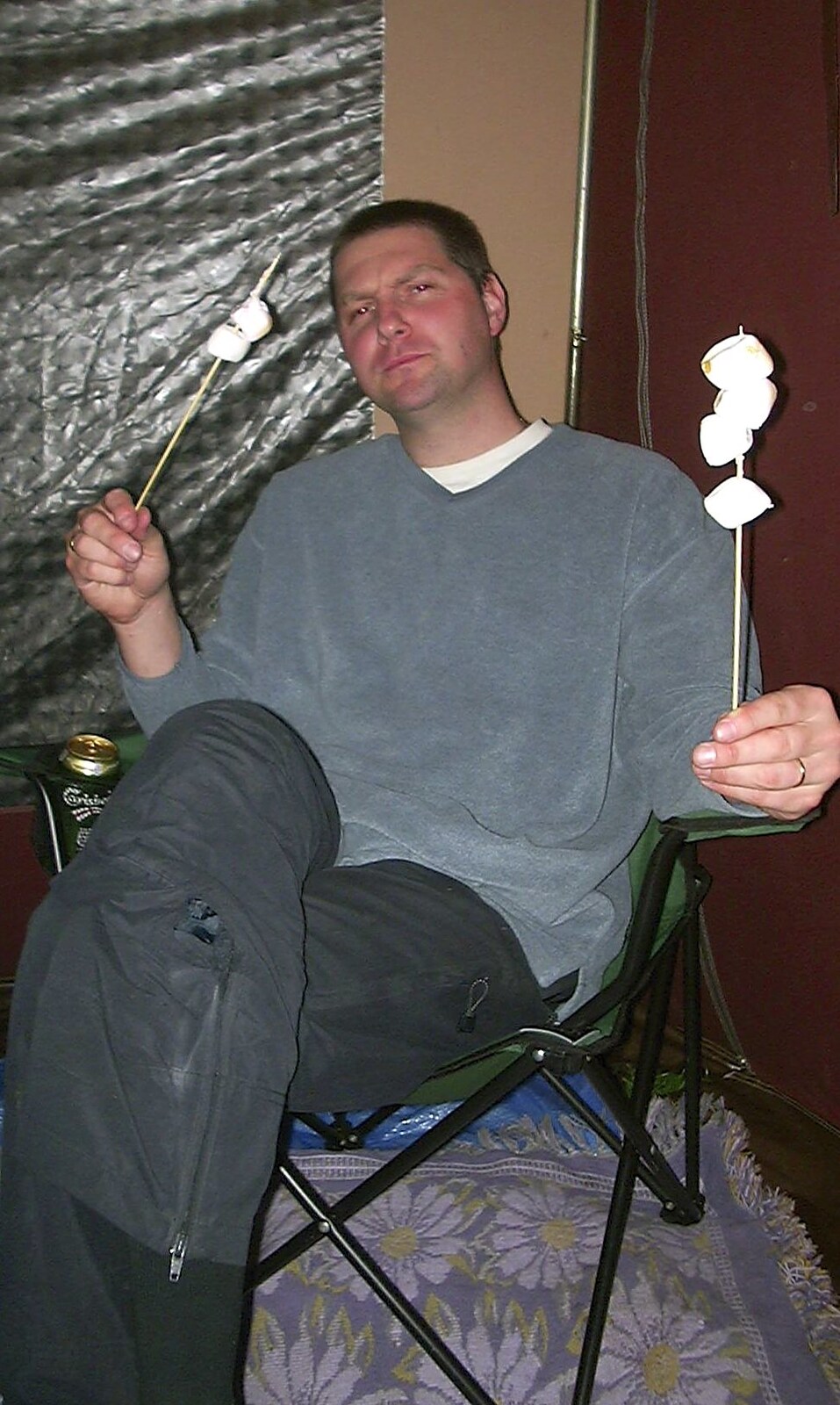 Sean has some sort of marshmallow on a stick from Corfe Castle Camping, Corfe, Dorset - 30th May 2004
