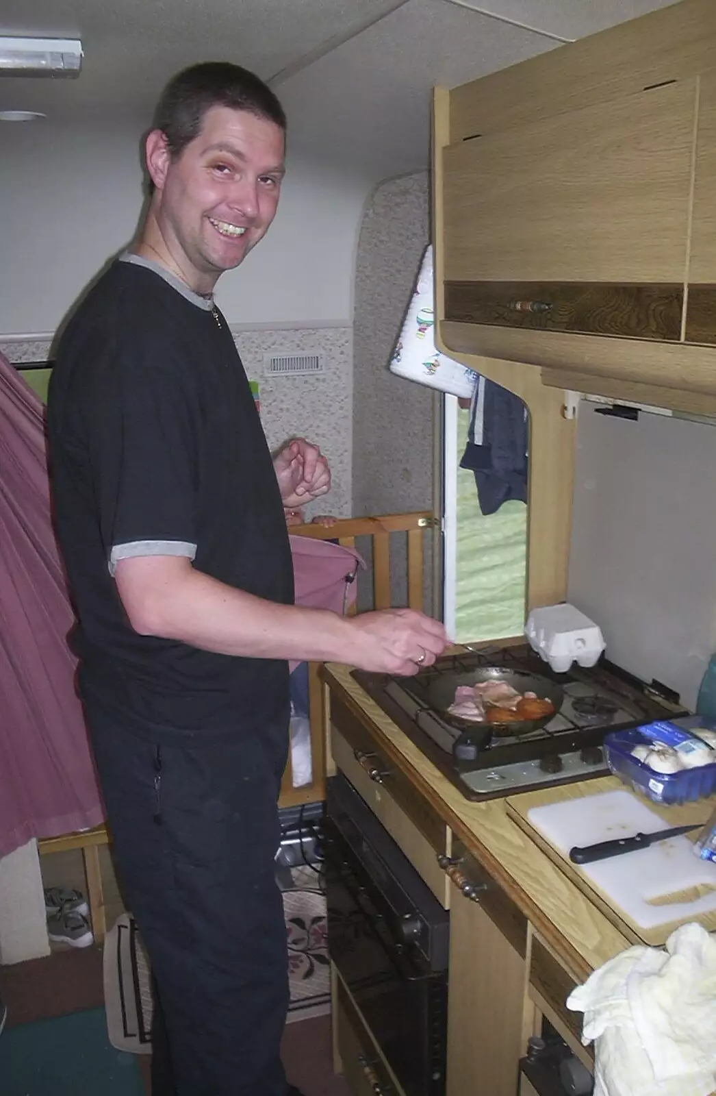 Sean is also frying up, from Corfe Castle Camping, Corfe, Dorset - 30th May 2004
