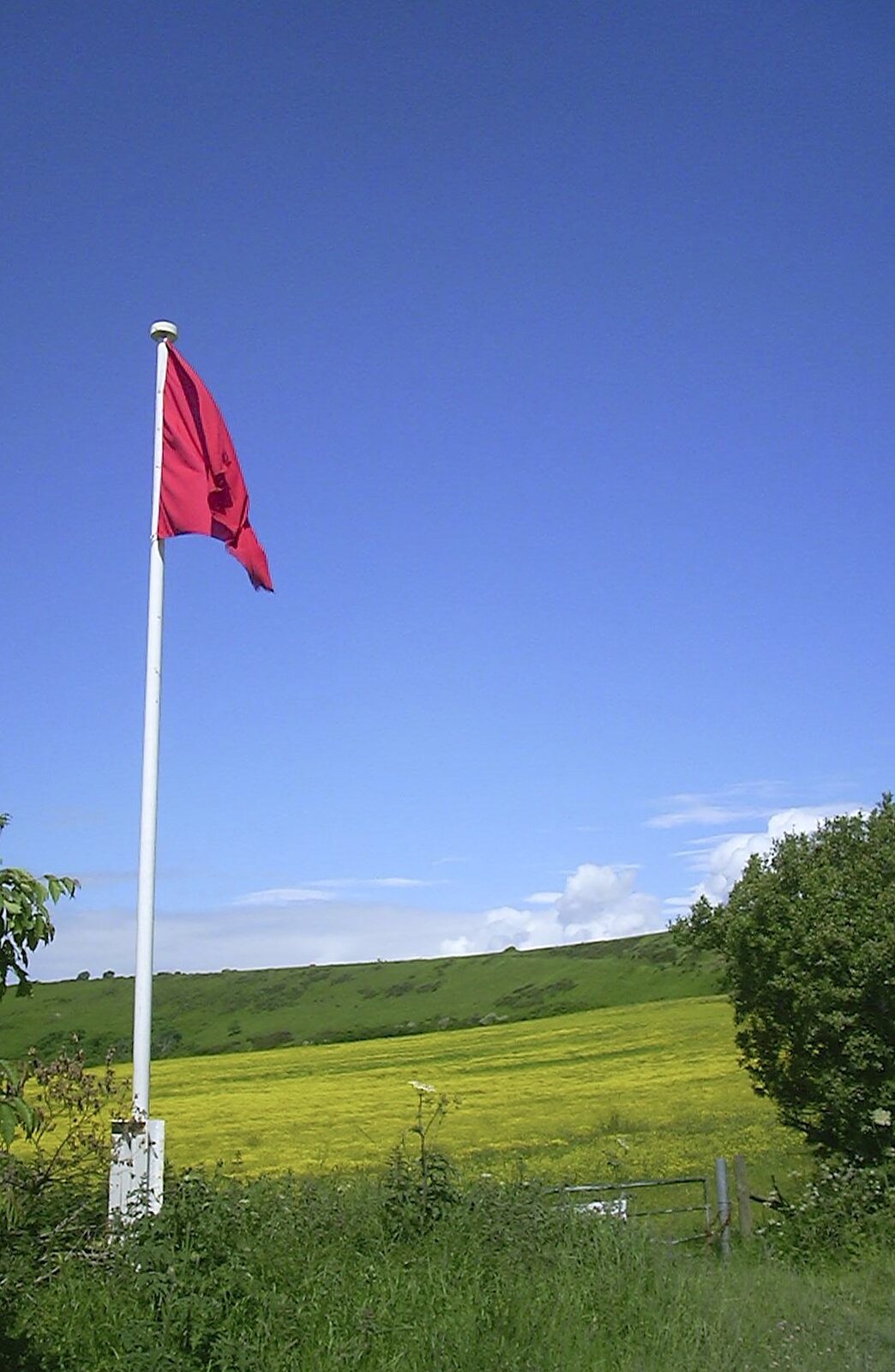 Corfe Castle Camping, Corfe, Dorset - 30th May 2004: The red flag warns that army ranges are all around