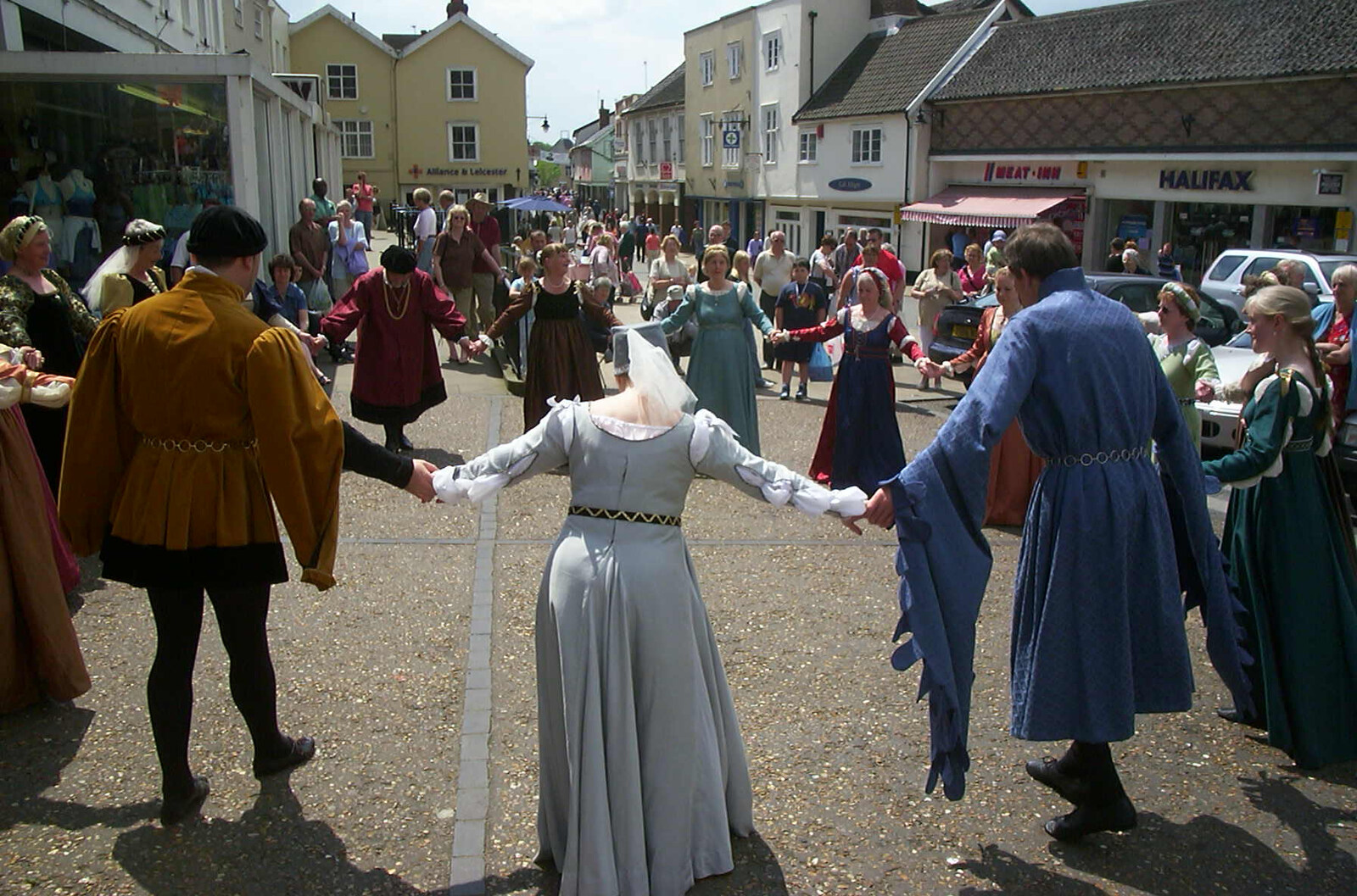 A ring of dancers on the market place from Andrey Leaves Trigenix, More Skelton Festival and a Transit of Venus, Cambridge and Diss - 4th June 2004