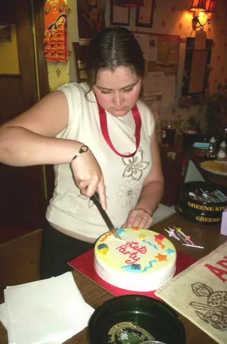 Claire cuts the cake, from A Transit of Venus and a Front Garden Barbeque, Brome - 11th June 2004